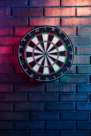 dartboard on a brick wallの写真素材