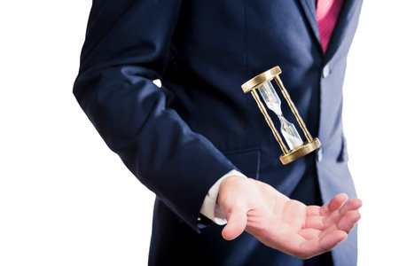 man with an hourglass floating on his hand, time concept