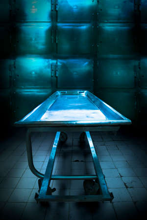 Grungy and high contrast photo of morgue traysの写真素材