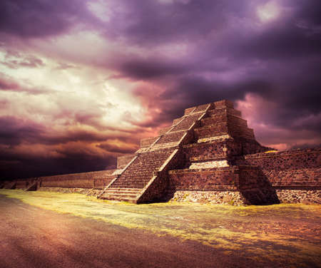 Aztec pyramid at sunset with dramatic skyの写真素材