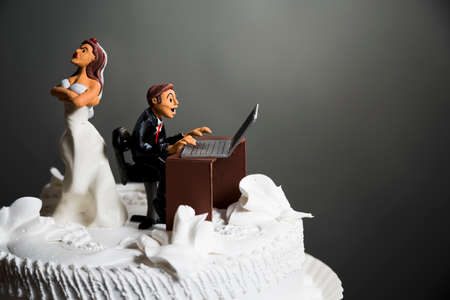 angry bride because her husband doesn't leave the computer alone.の写真素材