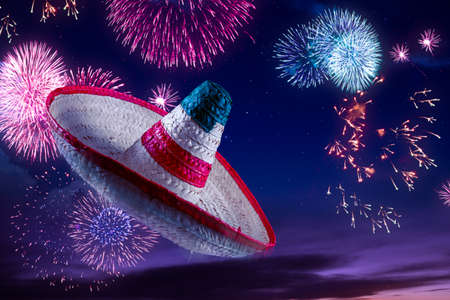 Mexican sombrero with fireworks at nightの写真素材