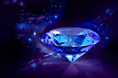 luxurious blue diamond shining on a black backgroundの写真素材