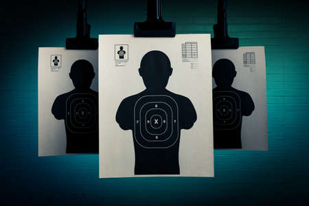 Shooting targets hanging on a grungy backgroundの写真素材