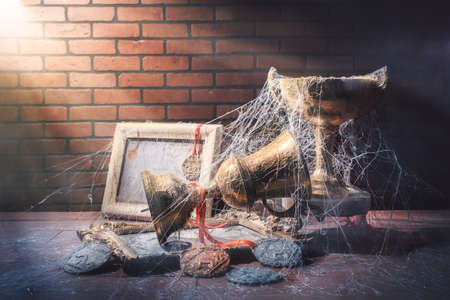 High contrast image of dusty trophies with cobwebs representing broken or abandoned dreamsの写真素材