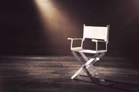 High contrast image of director chair made of paper / selective focusの写真素材