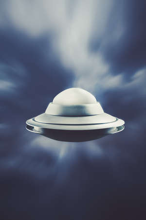 UFO Flying in the sky with motion blurの写真素材