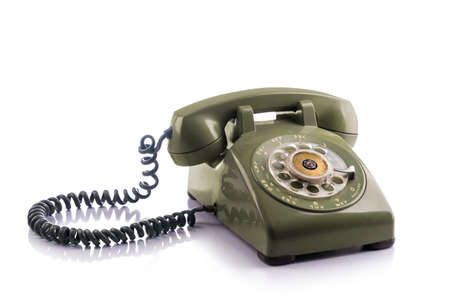 Vintage green telephone isolated on whiteの写真素材