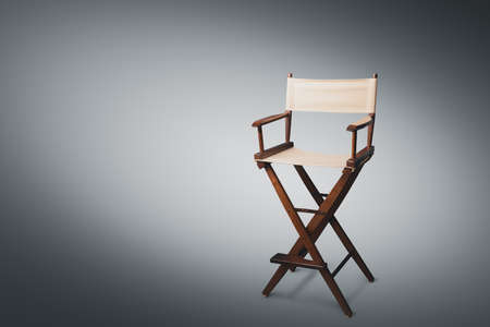 Vintage director chair on a gray backgroundの写真素材