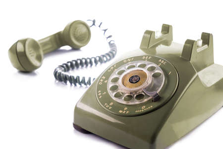 Vintage green telephone isolated on whiteの写真素材