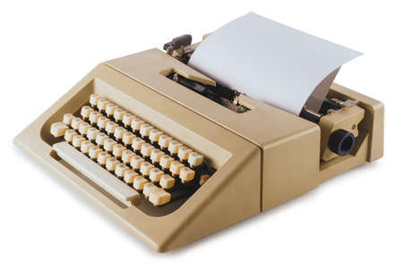 Vintage typewriter machine isolated on whiteの写真素材