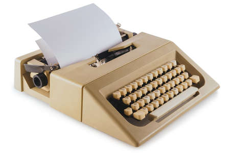 Vintage typewriter machine isolated on whiteの写真素材