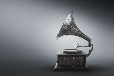 Old gramophone on a gray backgroundの写真素材