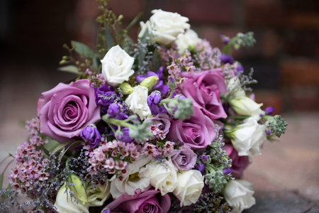 Gorgeous lilac bridal bouquet outdoorsの写真素材