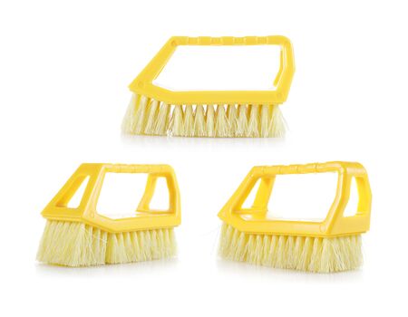 three pieces of yellow brush isolated on white backgroundの写真素材