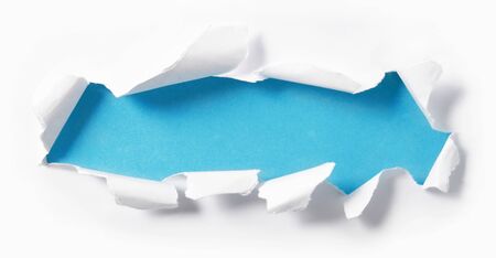 Paper torn with blue backgroundの写真素材