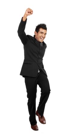 happy young businessman celebrating successの写真素材