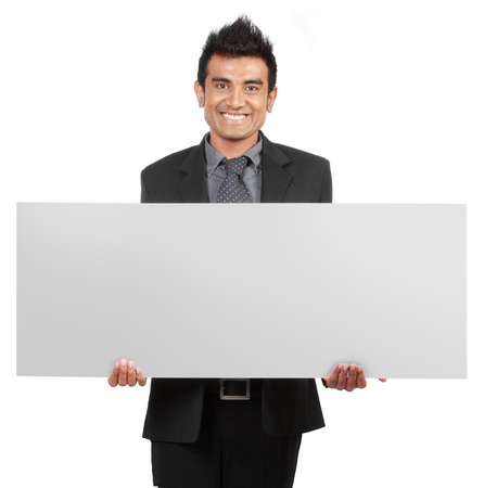 Handsome Businessman holding a blank sign isolated on white backgroundの写真素材