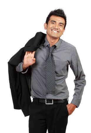 Happy young businessman standing isolated on whiteの写真素材