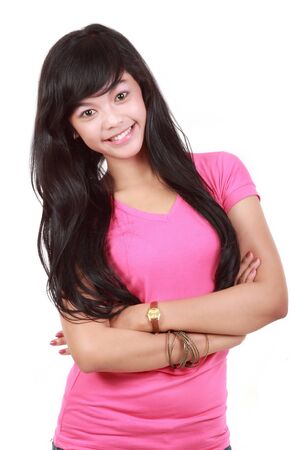 Beautiful woman standing against white backgroundの写真素材