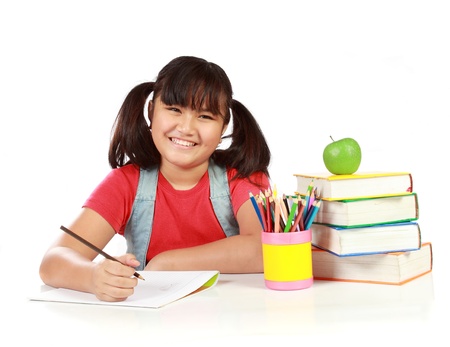 portrait of happy young girl studying. isolated over white backgroundの写真素材