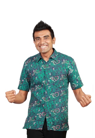 happy man celebrating his success isolated over a white backgroundの写真素材