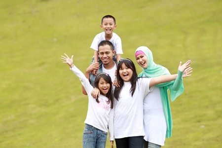 portrait of happy family having fun outdoorの写真素材