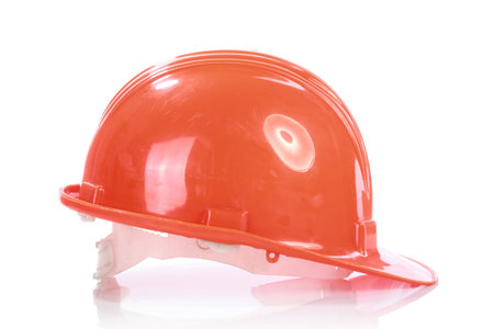 orange helmet for builder worker in white background