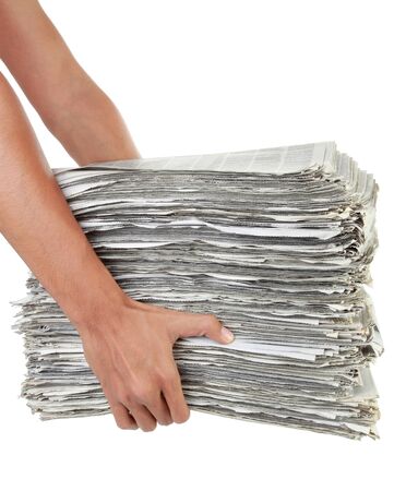 gesture of hand carrying newspaperの写真素材