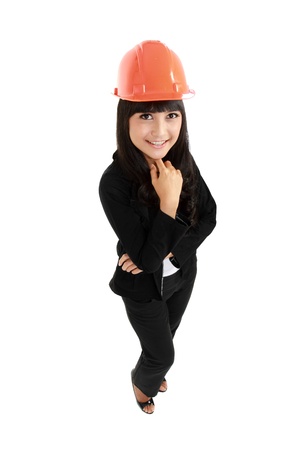 A pretty woman architect on isolated white backgroundの写真素材