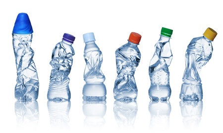 collection of empty used plastic bottles on white background.の写真素材