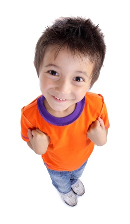 portrait of a happy little boy standing on white backgroundの写真素材