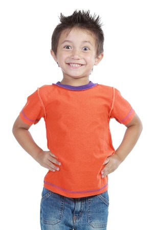 Portrait of a happy little young boy standing with over white backgroundの写真素材