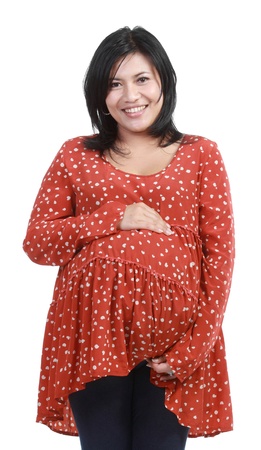 Pregnant woman in casual clothes isolated on white backgroundの写真素材