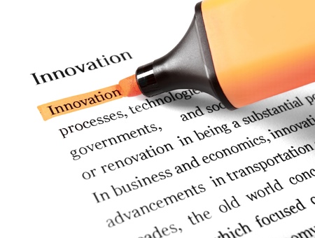 The word 'Innovation' highlighted in orange with felt tip penの写真素材