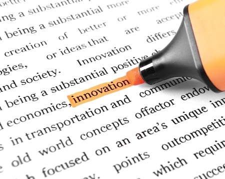 The word 'Innovation' highlighted in orange with felt tip penの写真素材