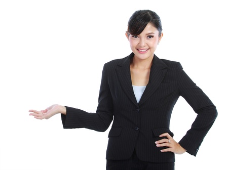 smiling beautiful business woman showing blank area for sign or copyspase, isolated on white backgroundの写真素材