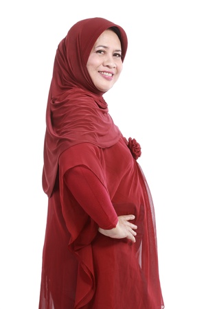 Confident Muslim woman in scarf, isolated over white backgroundの写真素材
