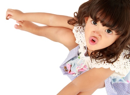 Portrait of happy smiling little girl on white backgroundの写真素材