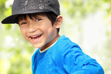close up portrait of kid smiling to the cameraの写真素材