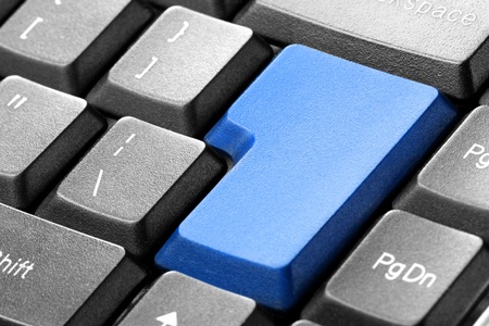 Closeup of blue blank button on the keyboardの写真素材