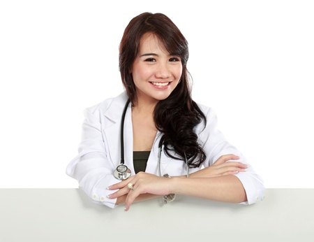 female young doctor with blank copy space and look at cameraの写真素材