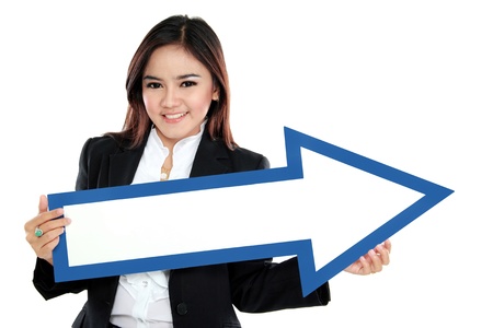 picture of smiling businesswoman with direction arrow sign on white backgroundの写真素材