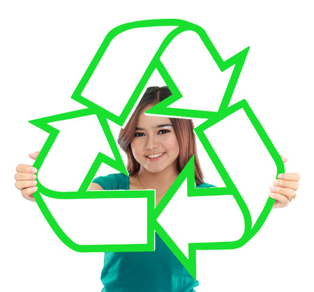 Asian young woman holding recycle sign の写真素材