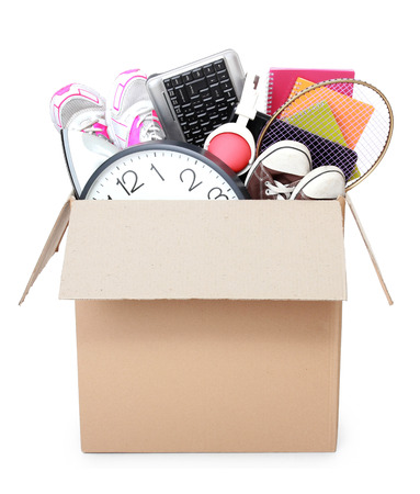 Cardboard box full of stuff ready for Moving Day isolated on white backgroundの写真素材
