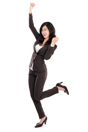Excited businesswoman very Excited. happy asian business woman isolated in full length on white background.の写真素材