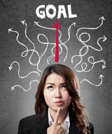 business woman concentration finding the way to reach goalの写真素材