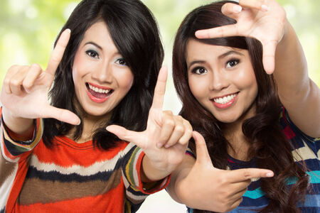 portrait of attractive two best friend having funの写真素材