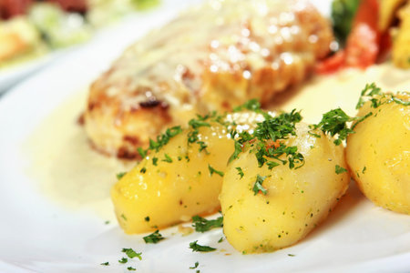 an additional menu, boiled potatoes with parsleyの写真素材