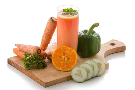 A potrait of a glass carrot and cucumber juiceの写真素材